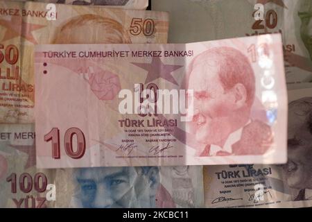 Illustration of Turkish lira banknotes, the currency of Turkey, in Turkish it is Türk liras?, with the sign: ? and code TRY or TL. The front side of the bill has has portraits of Mustafa Kemal Atatürk. The Turkish lira falls 15% in March 2021 after the head of the central bank governor was fired. Amsterdam, Netherlands on March 23, 2021.` (Photo by Nicolas Economou/NurPhoto) Stock Photo